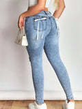 Distressed Skinny Jeans with Bow Back