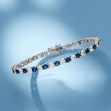 6.00 CTW Created White & Blue Sapphire Tennis Bracelet in 14K Gold Overlay – 7.25”