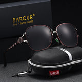 BARCUR Women’s Polarized Sunglasses – Oversized Elliptical Black Frame UV400 Protection Outdoor Fashion Mirror Leg Design High Quality Trendy Style Sunglasses for Travel Driving & Summer Apparel