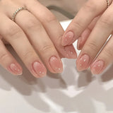24Pcs Short Oval Head Blush Pink Press on Nails with Simple Designs Almond Nails Wearable Acrylic Full Cover Nail Tips with Glue