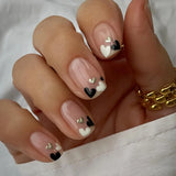 24 pieces of short square fake nails, featuring a halo dyed gradient heart and a colorful French design in European and American